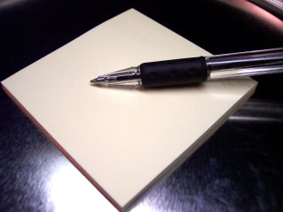 Illustrasjonsbilde av en blokk og en penn